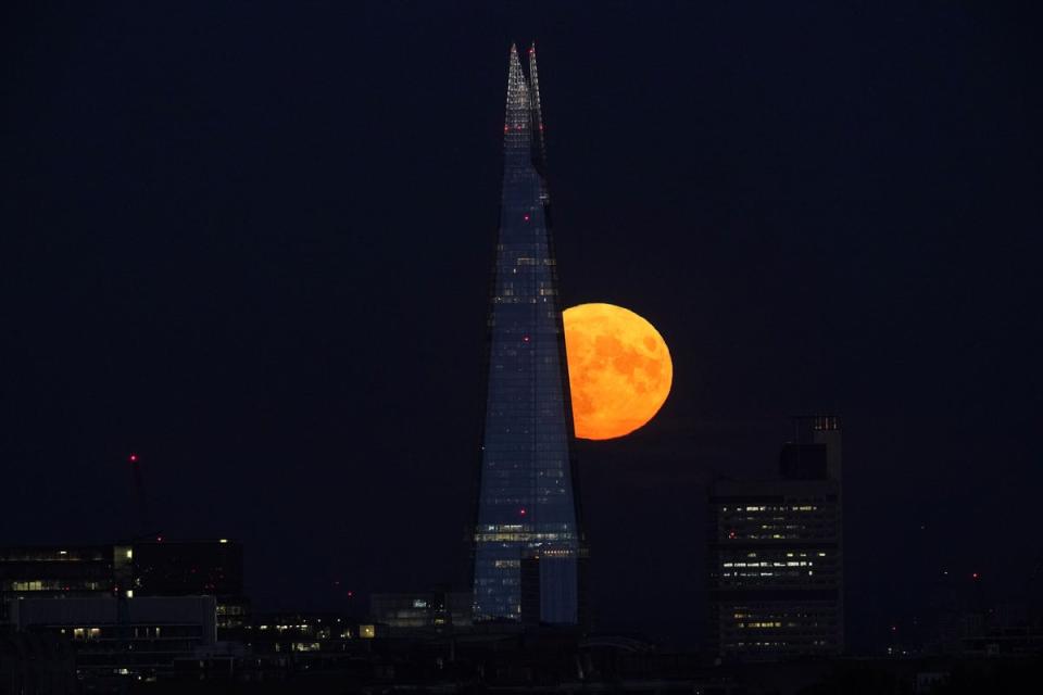 The Shard in London in front of the supermoon (Yui Mok/PA) (PA Wire)