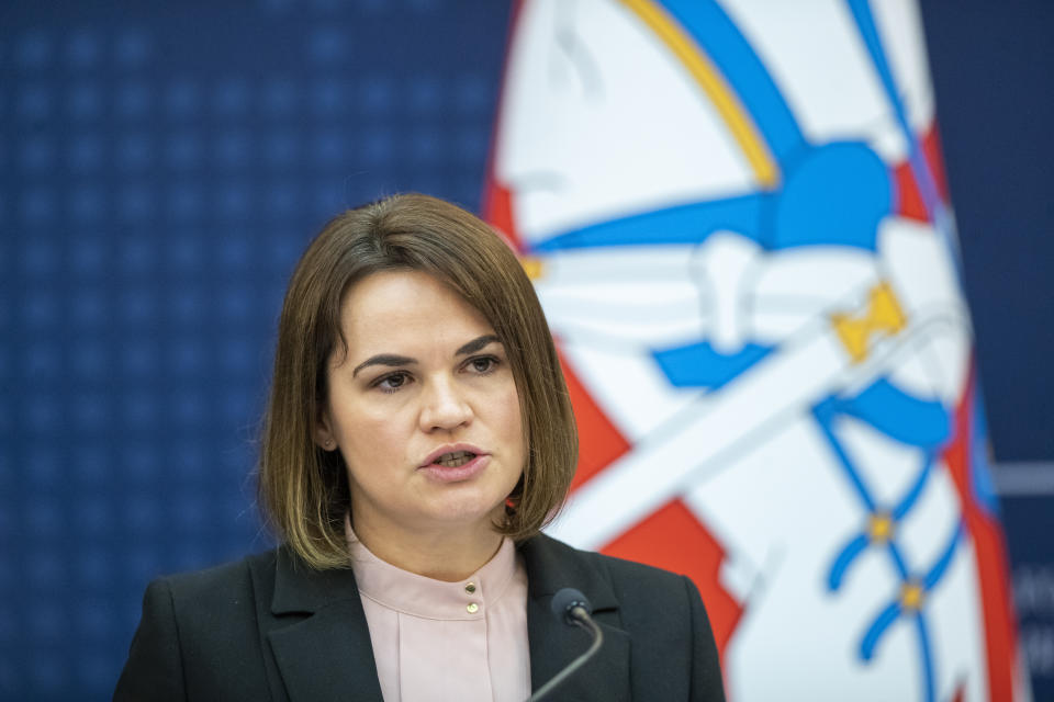 Belarusian opposition leader Sviatlana Tsikhanouskaya speaks during a press conference with Lithuania's Minister of Foreign Affairs Gabrielius Landsbergis in the Ministry of Foreign Affairs in Vilnius, Lithuania, Monday, Aug. 9, 2021. (AP Photo/Mindaugas Kulbis)