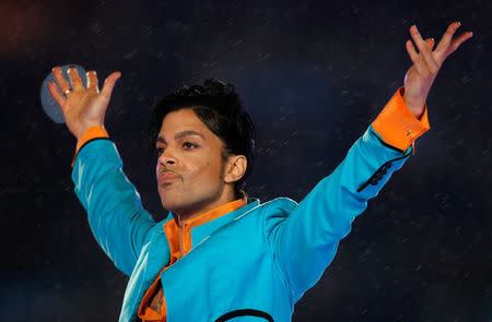 FILE PHOTO: Prince performs during the halftime show of the NFL's Super Bowl XLI football game in Miami, Florida, U.S., February 4, 2007. REUTERS/Mike Blake/File Photo