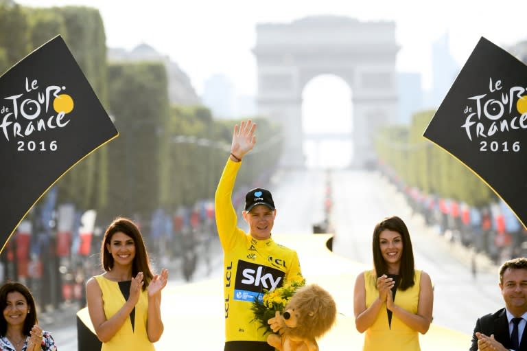 Chris Froome celebrates victory in the 2016 Tour de France on the Champs-Elysees on July 24, 2016