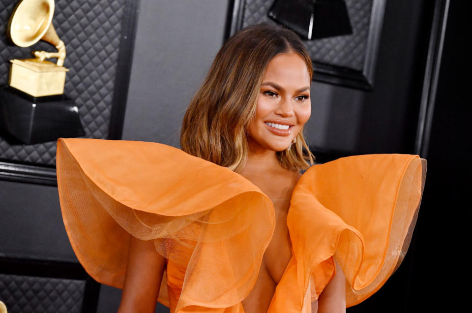 Chrissy Teigen has revealed she is having her breast implants removed, pictured at the Grammy Awards, January 2020. (Getty Images)