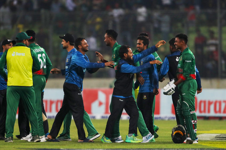 Bangladesh's players celebrate after winning the first one day international cricket match against India in Dhaka, Bangladesh, Sunday, Dec.4, 2022. (AP Photo Surjeet Yadav)