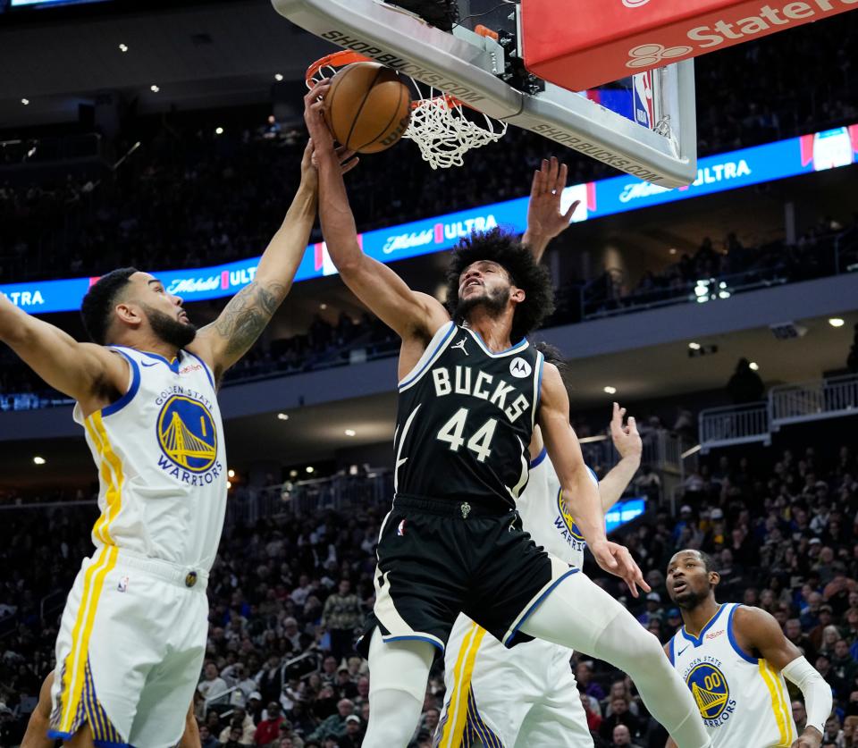 Bucks guard Andre Jackson Jr. has a shot blocked by Warriors guard Cory Joseph, but Jackson finished a double-double Saturday with 10 points and 10 rebounds.