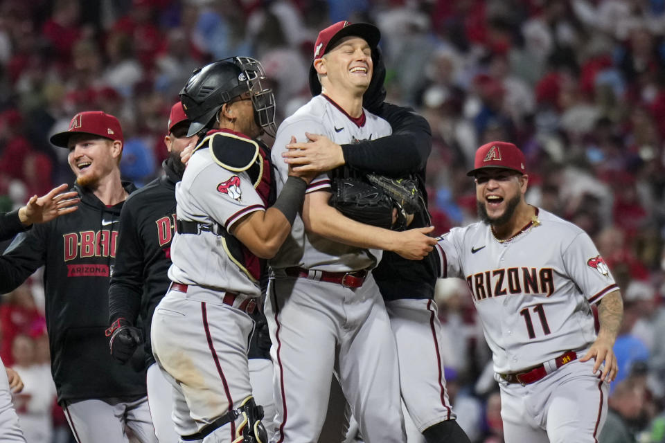 Arizona Diamondbacks relief pitcher Paul Sewald celebrates their win against the Philadelphia Phillies in Game 7 of the baseball NL Championship Series in Philadelphia Wednesday, Oct. 25, 2023. (AP Photo/Matt Slocum)