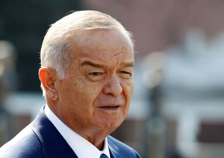 FILE PHOTO - Uzbek President Islam Karimov leaves after a wreath laying ceremony at the Tomb of the Unknown Soldier near Moscow's Kremlin walls, April 15, 2013. REUTERS/Grigory Dukor/File Photo