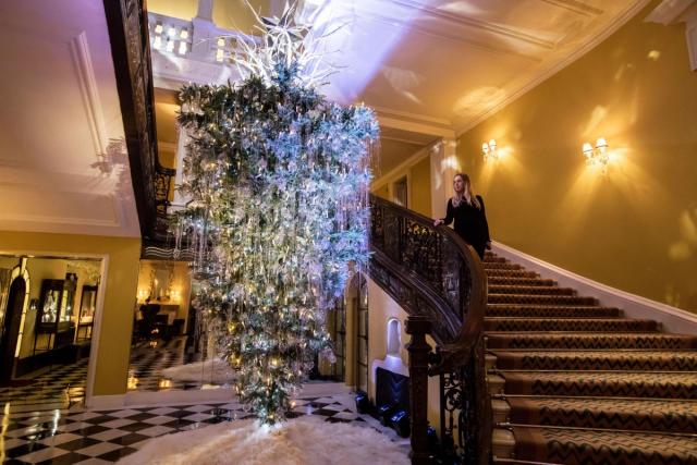 Louis Vuitton stacks travel trunks for Claridge's Christmas tree