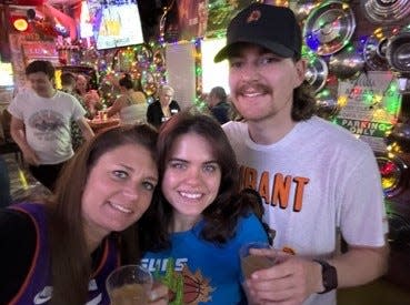 Maryalice "Molly" Cash (left) is pictured alongside her son, Winfield Cash (right) and his girlfriend, Madison Hodges, in this undated photo.