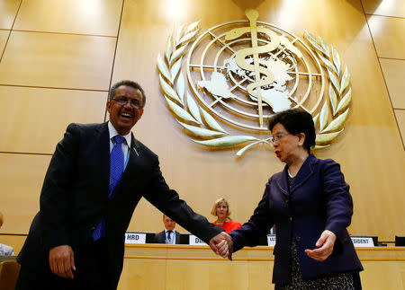 Outgoing Director-General Margaret Chan (R) congratulates Tedros Adhanom Ghebreyesus after his election as Director General of the World Health Organization (WHO) during the 70th World Health Assembly in Geneva, Switzerland, May 23, 2017. REUTERS/Denis Balibouse