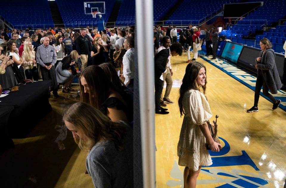Brooklyn Crouch of Upperman smiles with her Miss Basketball award as she poses for pictures following the 2022 TSSAA Mr. and Miss Basketball Awards ceremony at Murphy Center Monday, March 14, 2022 in Murfreesboro, Tenn.