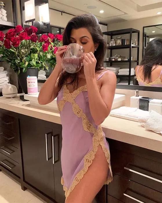 kourtney kardashian drinking in bathroom