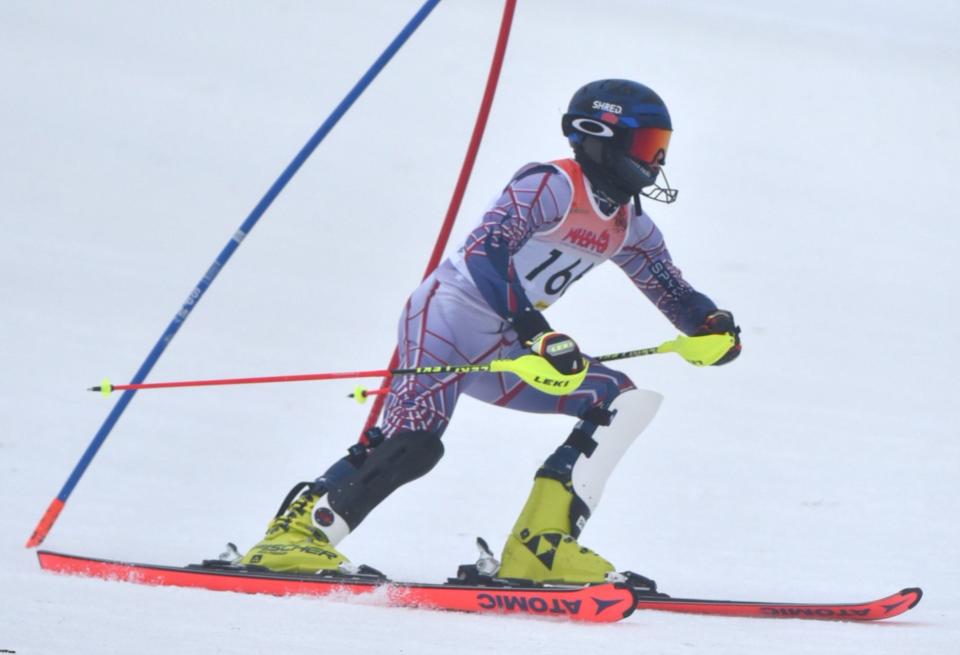 John Popov of Brighton won giant slalom and was fourth in slalom at the Mt. Brighton Divisional ski meet.