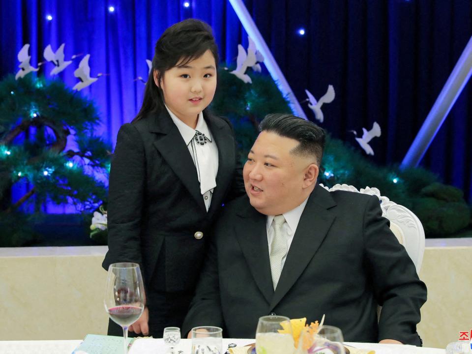 North Korean leader Kim Jong Un talks with his daughter Kim Ju Ae at a banquet to celebrate the 75th anniversary of the Korean People's Army the following day, in Pyongyang, North Korea February 7, 2023