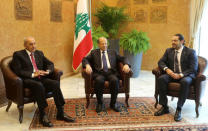 Lebanese President Michel Aoun meets with Saad al-Hariri, who announced his resignation as Lebanon's prime minister from Saudi Arabia and Lebanese Parliament Speaker Nabih Berri at the presidential palace in Baabda, Lebanon November 22, 2017. REUTERS/Aziz Taher