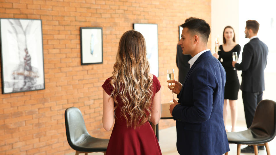 couple attending art gallery