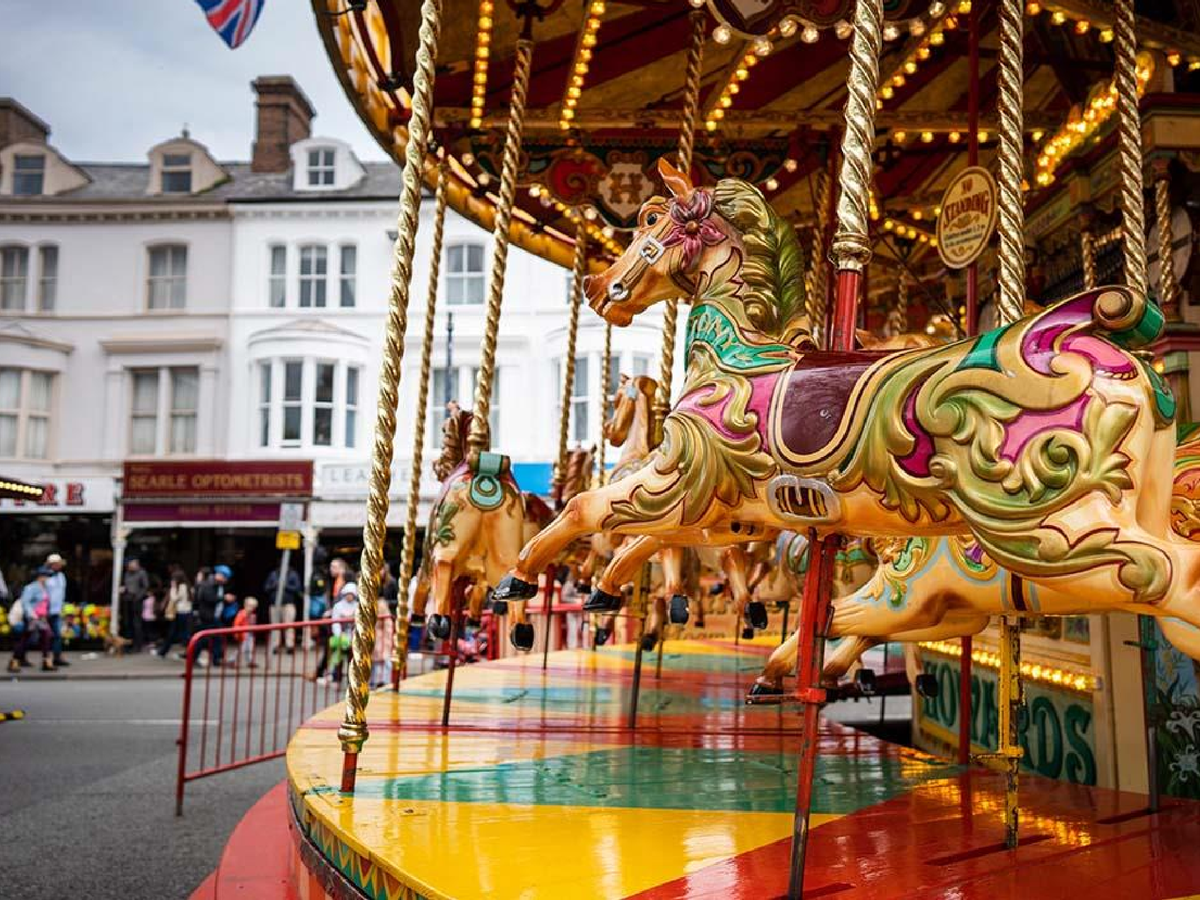 Traditional fair rides are part of the Victorian-themed weekend in the North Wales seaside town (Visit Conwy)