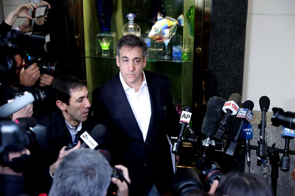 Michael Cohen addresses the press as he leaves his apartment to begin serving a 3-year sentence at a federal prison in New York on May 6, 2019. / Credit: Atilgan Ozdil/Anadolu Agency/Getty Images