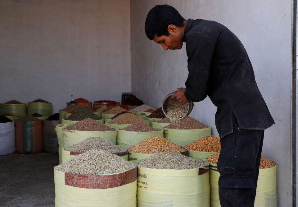 A Yemeni vendor displays various types of dry goods at a traditional market in Sanaa, Yemen, on Saturday, Oct. 1, 2022. Yemen’s warring parties face a deadline to renew a 6-month long truce on October 2. The conflict has left many Yemenis on the brink of starvation and food prices have spiked again amid an ongoing worldwide food crises. (AP Photo/Hani Mohammed)