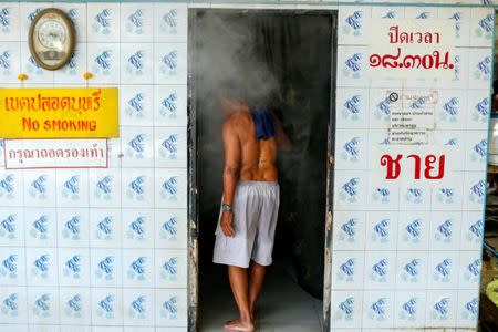 A patient enters a steam bath at the rehabilitation area at Wat Thamkrabok monastery in Saraburi province, Thailand, February 7, 2017. REUTERS/Jorge Silva