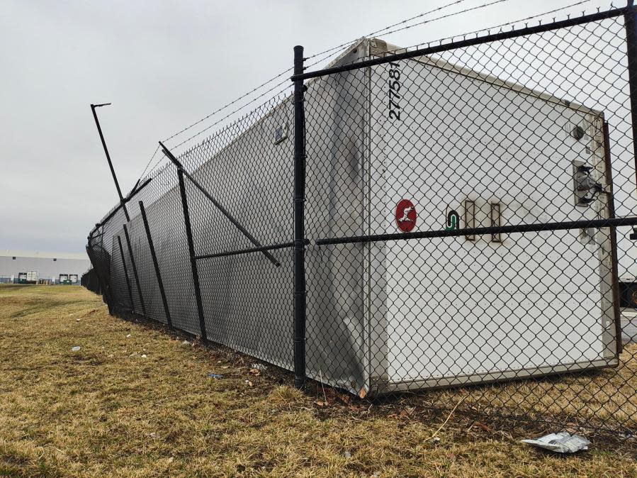 Four trailers fell against each other during Feb. 28, 2024 storms at a Groveport logistics center, overturning one and sending it smashing through the fence. (NBC4 Photo/Mark Feuerborn)