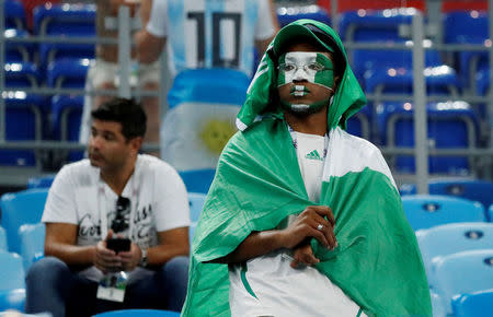 Soccer Football - World Cup - Group D - Nigeria vs Argentina - Saint Petersburg Stadium, Saint Petersburg, Russia - June 26, 2018 Nigeria fan looks dejected at the end of the match REUTERS/Toru Hanai