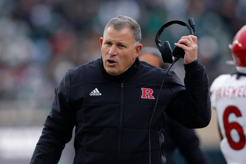 Rutgers coach Greg Schiano walks the sideline during the first half against Michigan State, Saturday, Nov. 12, 2022, in East Lansing, Mich. Michigan State won, 27-21.