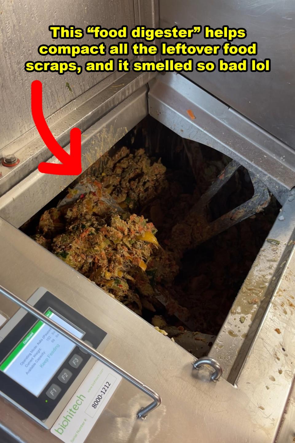 Food waste inside a commercial food digester with an annotation about its function and odor
