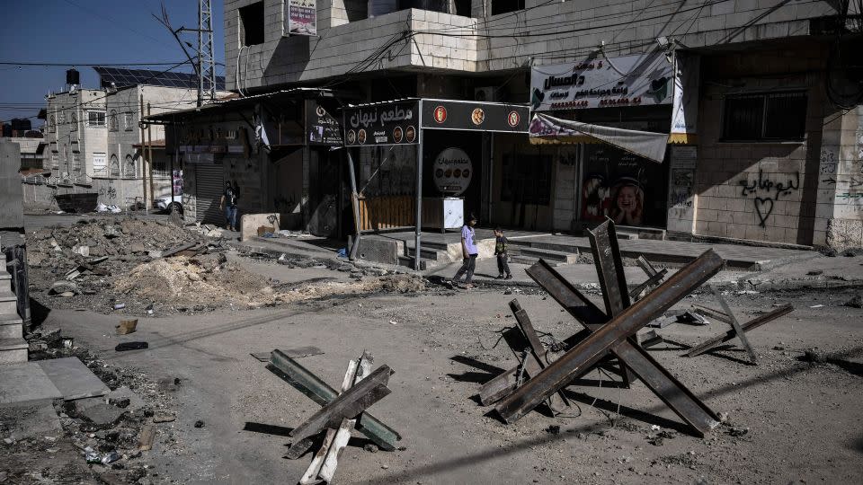 Road blocks on a destroyed street in the Jenin camp in the West Bank on Saturday, as violence surges in the region amid the war between Israel and Hamas. - Aris Messinis/AFP/Getty Images