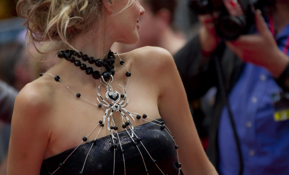 British actress Donna Air arrives in a Scott Henshaw creation for the UK premiere of The Amazing Spider-Man at a central London cinema, Monday, June 18, 2012. (AP Photo/Joel Ryan)