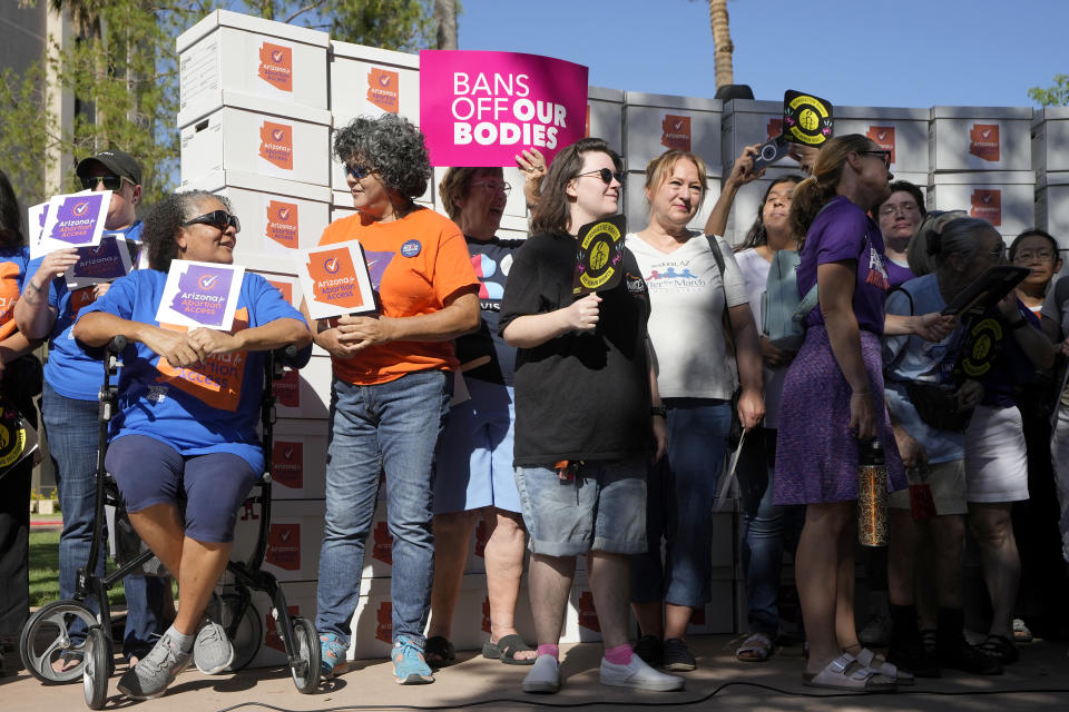 Arizona abortion-rights supporters gather for a news conference prior to delivering over 800,000 petition signatures to the capitol to get abortion rights on the November general election ballot Wednesday, July 3, 2024, in Phoenix. (AP Photo/Ross D. Franklin)