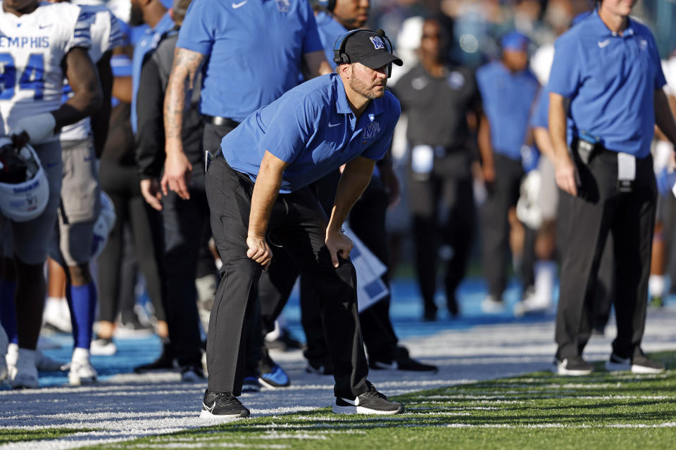 Memphis head coach Ryan Silverfield watches a play from the sideline during the second half of an NCAA college football game against Tulane in New Orleans, Saturday, Oct. 22, 2022. Tulane won 38-28. (AP Photo/Tyler Kaufman)