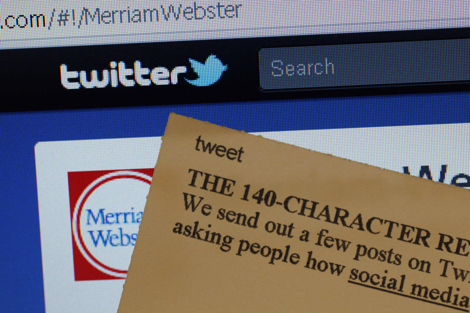 FILE - This Aug. 24, 2011 file photo displays an index card with the entry "tweet" next to a computer screen showing the Twitter website, at the Merriam-Webster headquarters in Springfield, Mass. Elon Musk may want to send “tweet” back to the birds, but the ubiquitous term for posting on the site he now calls X is here to stay, at least for now. For one, the word is still plastered all over the website formerly known as Twitter. Write a post, you still need to press a blue button that says “tweet” to publish it. To repost it, you still tap “retweet.” (AP Photo/Charles Krupa)