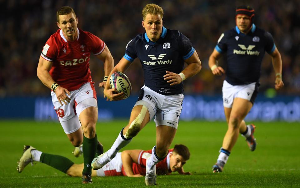 Scotland's wing Duhan van der Merwe makes a break against Wales in 2023