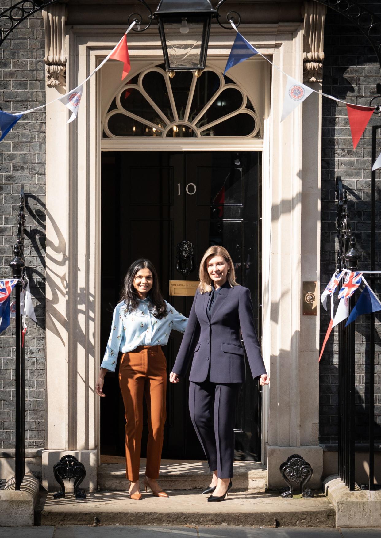 Akshata Murty (left) the wife of Prime Minister Rishi Sunak, greets the First Lady of Ukraine Olena Zelenska outside 10 Downing Street, London during her visit to the UK (PA)