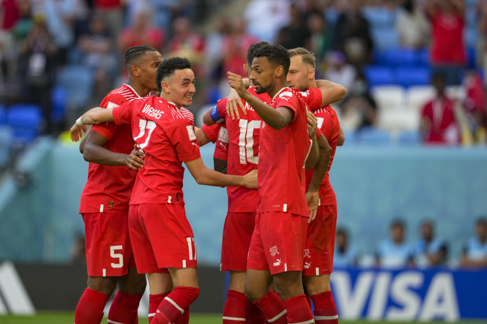 AL WAKRAH, QATAR - NOVEMBER 24: Breel Embolo (Switzerland) celebrates after scoring his team's first goal with teammates during the FIFA World Cup Qatar 2022 Group G match between Switzerland and Cameroon at Al Janoub Stadium on November 24, 2022 in Al Wakrah, Qatar. (Photo by Ulrik Pedersen/DeFodi Images via Getty Images)