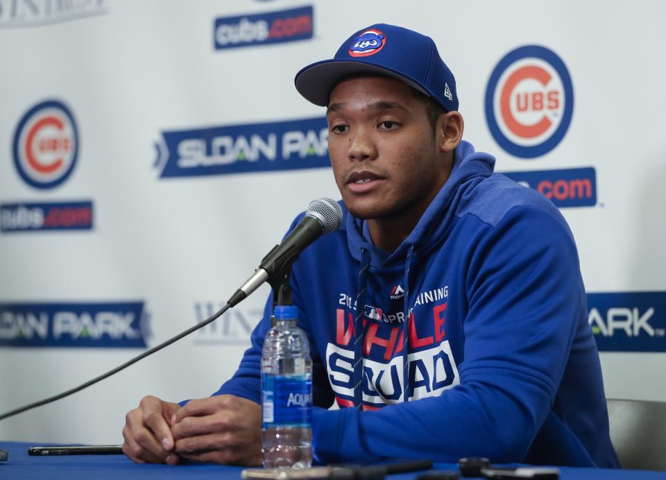 Chicago Cubs shortstop Addison Russell speaks at a press conference after a spring training baseball workout Friday, Feb. 15, 2019, in Mesa, Ariz. (AP Photo/Morry Gash)