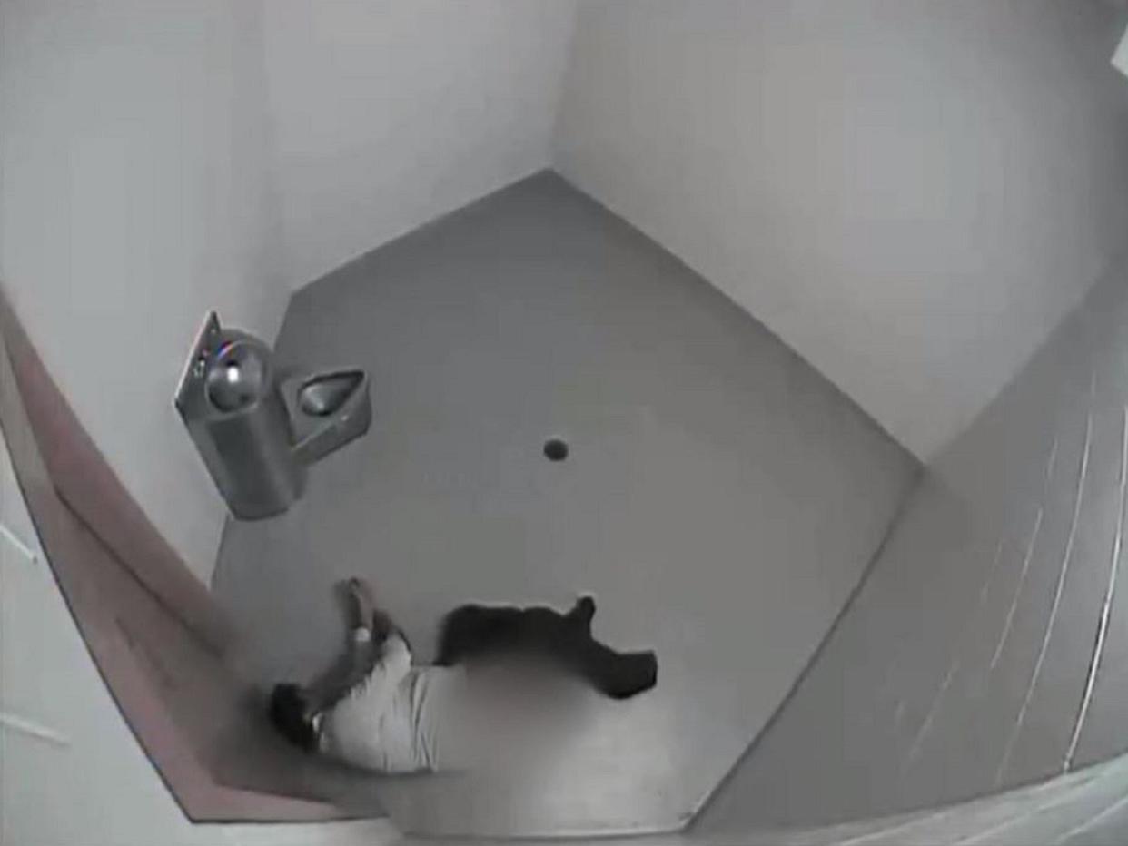 CCTV footage of Alan Ruel, from Alberta, Canada, lying on the floor of a police cell after allegedly suffering a massive stroke following his arrest for being drunk in public in July 2015: CBC News