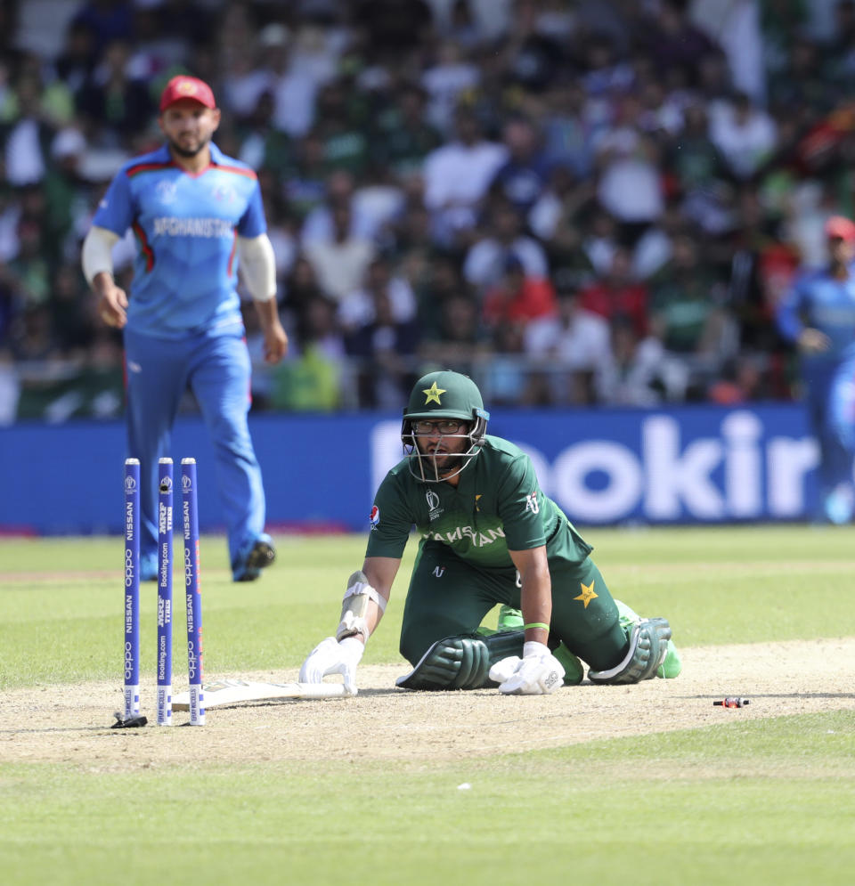 Pakistan's Imam-ul-Haq attempts to complete a run during the Cricket World Cup match between Pakistan and Afghanistan at Headingley in Leeds, England, Saturday, June 29, 2019. (AP Photo/Rui Vieira)