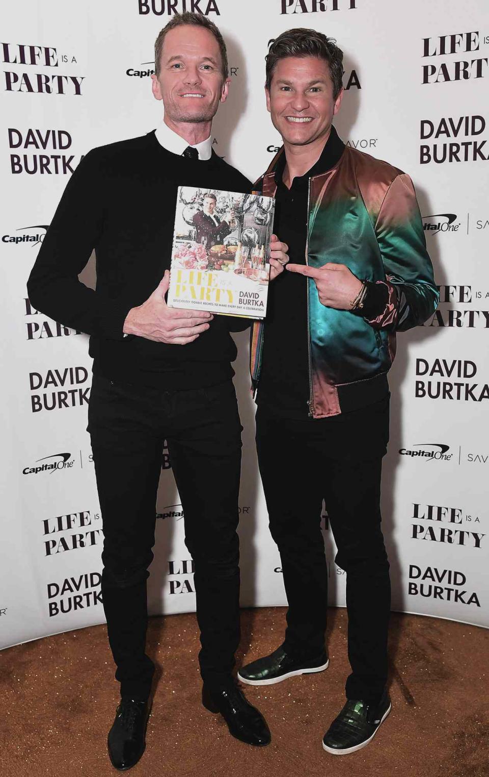 Neil Patrick Harris (L) and David Burtka attend the Launch of Burtka's new cookbook "Life Is A Party" at The Top of The Standard on April 15, 2019 in New York City