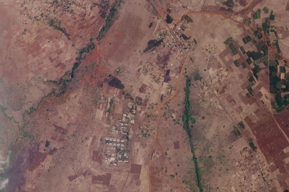 FILE - In this file satellite photo dated April 22, 2021 provided by Planet Labs shows an agricultural college where witnesses say ethnic Tigrayans have been detained for months without charge, one of several such detention centers across the country. Some thousands of Eritrean refugees are among the most vulnerable groups in the conflict and are increasingly caught in the middle of the conflict in Ethiopia’s Tigray region. (Planet Labs, FILE via AP)