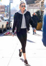 <p>The star hit the streets in a sporty ensemble that consisted of a distressed gray hoodie, bomber jacket, black cropped leggings, and Rebook sneakers.</p>