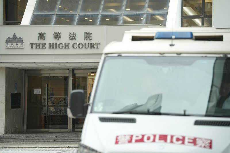 A police vehicle is pictured outside the High Court where a court hearing on property developer China Evergrande Group is held, in Hong Kong