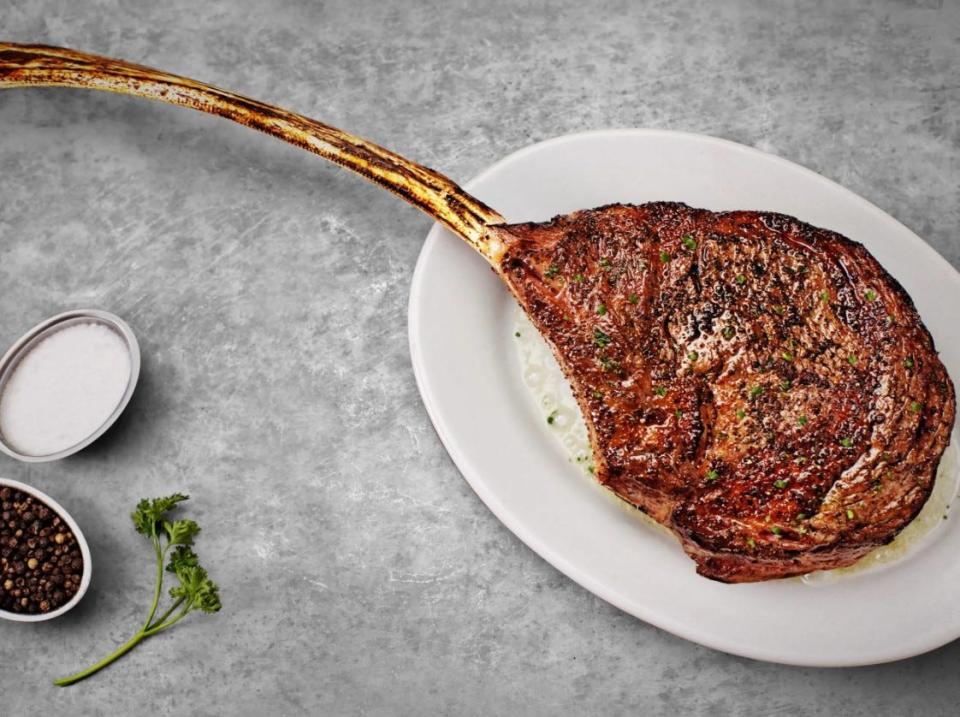 The 40-ounce tomahawk steak at Ruth's Chris Steak House is big enough to feed two.