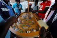 African migrants gamble at a makeshift home on the outskirts of Casablanca, Morocco September 5, 2018. REUTERS/Youssef Boudlal