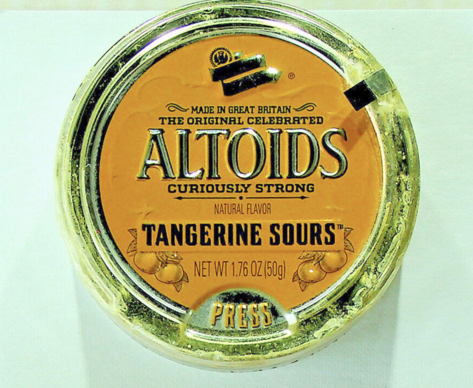 A tin of tangerine Altoids Sours
