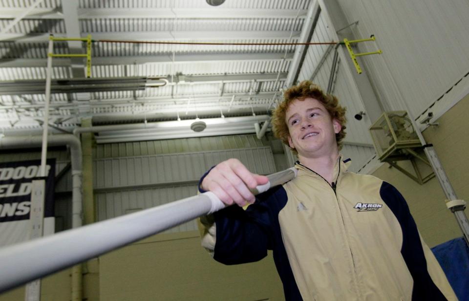 University of Akron pole vaulter Shawn Barber stands before the vault raised to 18 feet inside the Stile Athletics Field House on Jan. 15, 2013, in Akron.