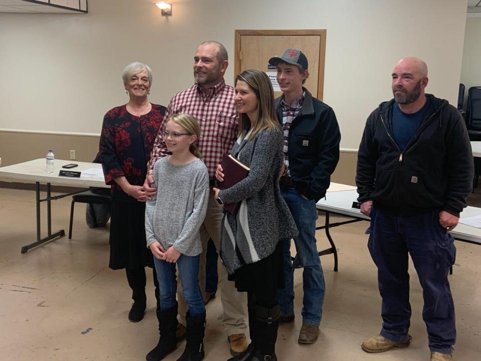 Jeremy Hensley received the most votes among the six candidates vying for a seat on the Madison County Board of Commissioners in the Nov. 8 election. Briggs is pictured here, second from left, with his family after being sworn in as county commissioner.