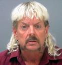 <p>In 2019, Maldonado-Passage was found guilty of paying a hitman $3,000 to kill his rival, <a href="https://people.com/crime/joe-exotic-animal-activist-murder-for-hire/" rel="nofollow noopener" target="_blank" data-ylk="slk:Carole Baskin;elm:context_link;itc:0;sec:content-canvas" class="link ">Carole Baskin</a>, an animal activist and big-cat lover who runs a sanctuary called the Big Cat Rescue in Tampa, Fla. The hit did not go through, and he is currently <a href="https://people.com/crime/tiger-king-joe-exotic-resentenced-to-21-years-in-murder-for-hire-plot-against-carole-baskin/" rel="nofollow noopener" target="_blank" data-ylk="slk:serving 21 years;elm:context_link;itc:0;sec:content-canvas" class="link ">serving 21 years</a> for the attempted murder plot.</p> <p>Exotic was also found guilty of killing tigers to make room for more big cats at his exotic animal park in Oklahoma.</p> <p>Soon after <em><a href="https://people.com/tag/tiger-king/" rel="nofollow noopener" target="_blank" data-ylk="slk:Tiger King: Murder, Mayhem and Madness;elm:context_link;itc:0;sec:content-canvas" class="link ">Tiger King: Murder, Mayhem and Madness</a> </em>premiered on Netflix in March 2020 and drew in <a href="https://people.com/tv/tiger-king-reached-34-million-u-s-viewers-in-its-first-10-days/" rel="nofollow noopener" target="_blank" data-ylk="slk:over 34 million;elm:context_link;itc:0;sec:content-canvas" class="link ">over 34 million</a> unique U.S. viewers within the first 10 days of its release, the former zookeeper and country music singer filed a federal lawsuit against various government agencies, as well as his former business partner, seeking $94 million in damages.</p> <p>Since shooting to stardom, Exotic was <a href="https://people.com/crime/tiger-king-joe-exotic-released-from-isolation-after-move-to-medical-center-amid-coronavirus-concerns/" rel="nofollow noopener" target="_blank" data-ylk="slk:removed from isolation;elm:context_link;itc:0;sec:content-canvas" class="link ">removed from isolation</a> in prison after fans wrote to have him released to more open housing, but <a href="https://people.com/crime/joe-exotic-speaks-out-not-receiving-pardon-from-donald-trump/" rel="nofollow noopener" target="_blank" data-ylk="slk:did not receive a pardon;elm:context_link;itc:0;sec:content-canvas" class="link ">did not receive a pardon</a> by former President Donald Trump. In March 2021, Joe and his husband Dillon Passage <a href="https://people.com/tv/joe-exotic-dillon-passage-not-in-a-hurry-to-legally-divorce-report/" rel="nofollow noopener" target="_blank" data-ylk="slk:announced they were divorcing;elm:context_link;itc:0;sec:content-canvas" class="link ">announced they were divorcing</a> – but were not "in a hurry" to make their split legal, Joe told his attorney via email, according to <a href="https://www.tmz.com/2021/03/27/joe-exotic-dillon-passage-divorce-staying-married-complicated/" rel="nofollow noopener" target="_blank" data-ylk="slk:TMZ;elm:context_link;itc:0;sec:content-canvas" class="link ">TMZ</a>, though Exotic did end up <a href="https://people.com/tv/tiger-king-joe-exotic-files-for-divorce-from-husband-dillon-passage/" rel="nofollow noopener" target="_blank" data-ylk="slk:filing for divorce in March 2022;elm:context_link;itc:0;sec:content-canvas" class="link ">filing for divorce in March 2022</a> because of a relationship with fellow inmate John Graham. By June of that year, Exotic and Graham's engagement was no more and he was <a href="https://people.com/tv/joe-exotic-rekindles-romance-with-ex-boyfriend-after-broken-engagement/" rel="nofollow noopener" target="_blank" data-ylk="slk:in a relationship;elm:context_link;itc:0;sec:content-canvas" class="link ">in a relationship</a> with a former boyfriend named Seth.</p> <p>In early November 2021, the big cat lover revealed that he had <a href="https://people.com/health/tiger-king-joe-exotic-says-he-has-aggressive-cancer-in-note-from-prison/" rel="nofollow noopener" target="_blank" data-ylk="slk:been diagnosed;elm:context_link;itc:0;sec:content-canvas" class="link ">been diagnosed</a> with "aggressive" prostate cancer.</p> <p>"Right now I don't want anyone's pity and I'm sure Carole will have her own party over this," he said <a href="https://www.instagram.com/p/CV0xfhSPc_V/?utm_source=ig_embed&ig_rid=1cc5cb3c-57aa-4782-9a75-73fbaf347588" rel="nofollow noopener" target="_blank" data-ylk="slk:in a statement;elm:context_link;itc:0;sec:content-canvas" class="link ">in a statement</a> regarding the news.</p> <p>In August 2022, Exotic <a href="https://people.com/tv/joe-exotic-reveals-friendship-with-90-day-fiance-jesse-meester-hopes-to-secure-pardon/" rel="nofollow noopener" target="_blank" data-ylk="slk:said that he hoped;elm:context_link;itc:0;sec:content-canvas" class="link ">said that he hoped</a> that a new friendship <a href="https://people.com/tag/90-day-fiance/" rel="nofollow noopener" target="_blank" data-ylk="slk:90 Day Fiancé;elm:context_link;itc:0;sec:content-canvas" class="link "><em>90 Day Fiancé</em></a> alum <a href="https://people.com/tv/90-day-fiance-jesse-meester-looking-for-love-tlcfind-love-live/" rel="nofollow noopener" target="_blank" data-ylk="slk:Jesse Meester;elm:context_link;itc:0;sec:content-canvas" class="link ">Jesse Meester</a> would eventually lead to a pardon from President Joe Biden.</p>