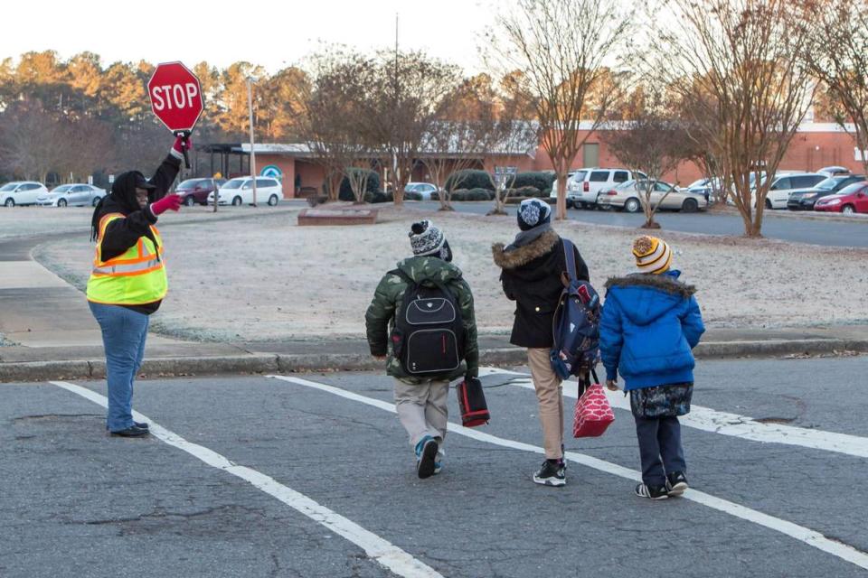 On March 21, a crossing guard was hit and killed by a vehicle in Fort Mill. Concerns for crossing guard and student safety along busy roadways throughout the Rock Hill region have been ongoing for years. Jeff Sochko/Special to The Herald/Herald file photo