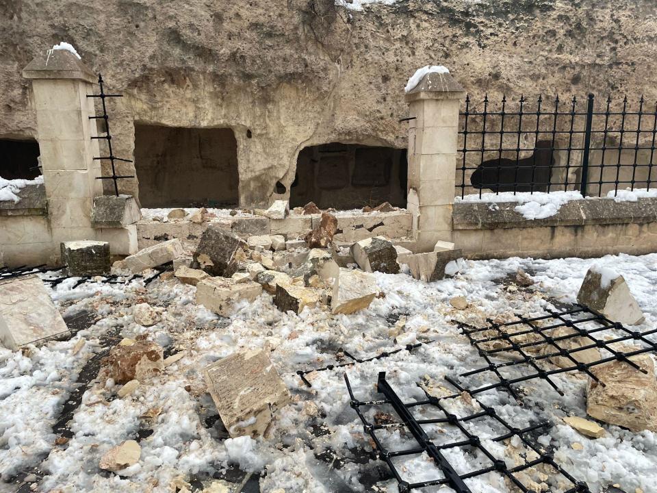 Videos and photos of the castle after the earthquake show large chunks of the rock facade have fallen off and an iron fence broken and bent by fallen rock. / Credit: Mehmet Akif Parlak/Anadolu Agency via Getty Images