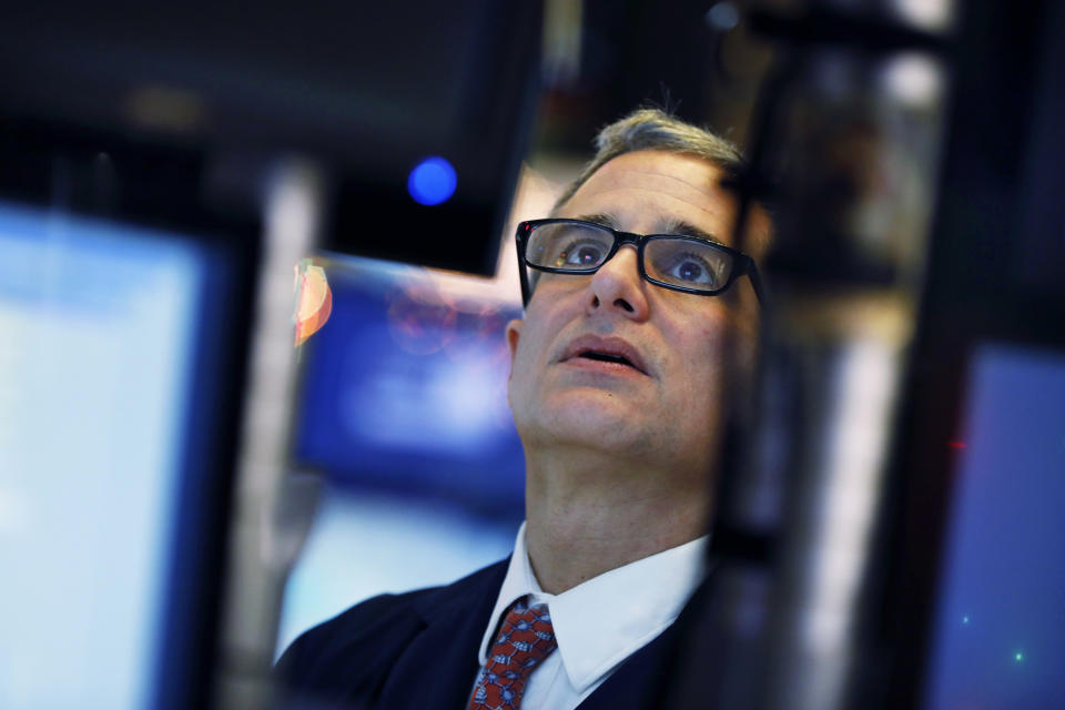 Specialist Anthony Rinaldi works at his post on the floor of the New York Stock Exchange, Thursday, Dec. 6, 2018. U.S. stocks tumbled in early trading Thursday following a sell-off in overseas markets. (AP Photo/Richard Drew)